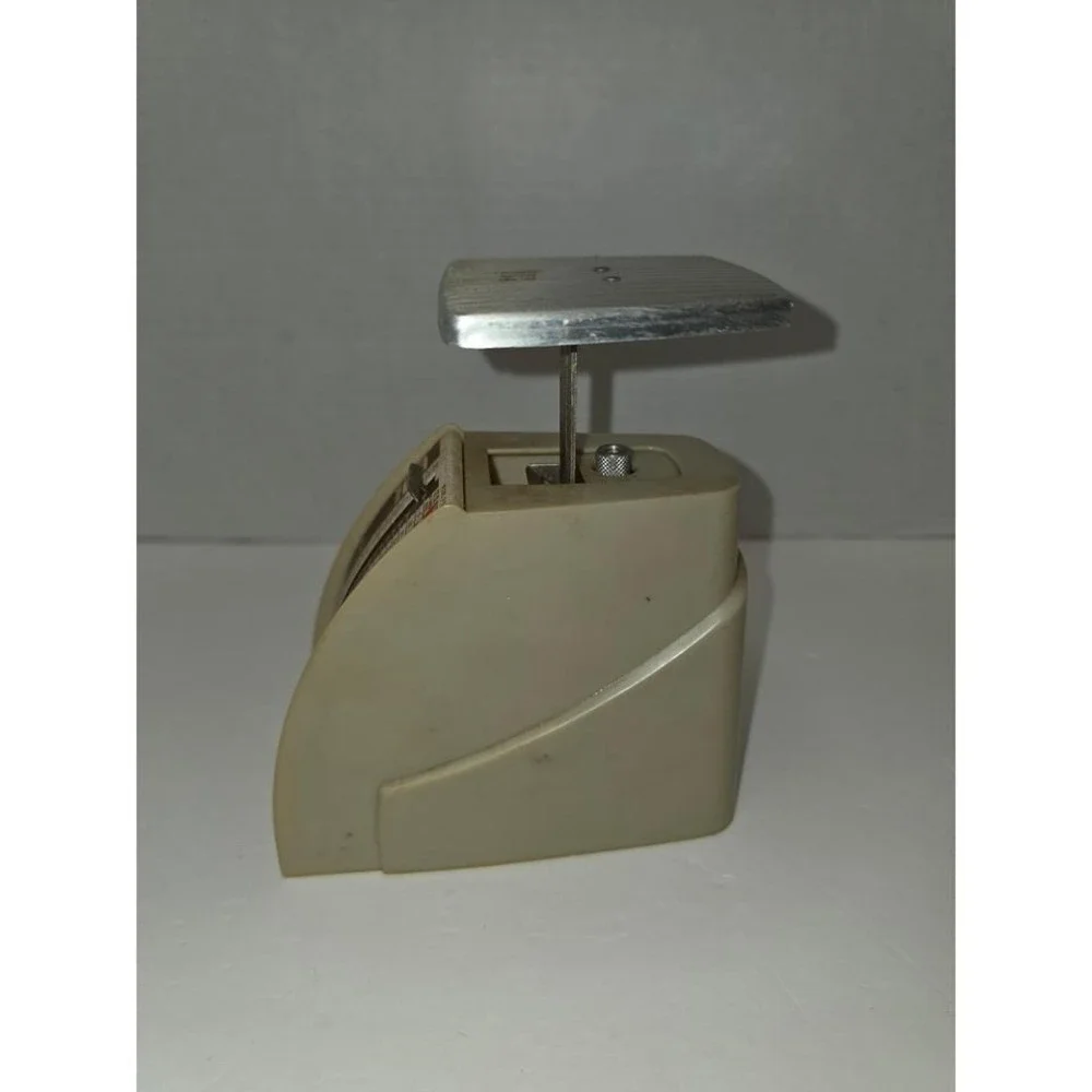 vintage Pelouze Model P-2 postal scale designed to weigh parcels up to 2 pounds.